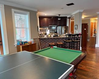 Pool table with all the essentials and also a table tennis set the fits on top