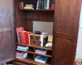 Armoire with a variety of books
