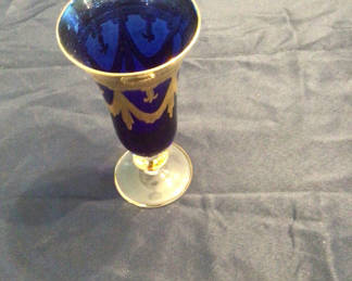 Lot 94: Blue cobalt glass goblet with gold trim