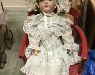 Lot 494: Porcelain doll in pale blue lace dress with bonnet