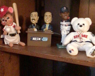 Lot 48: Baseball-themed stuffed animals and figurines on a shelf