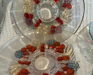 Lot 470: Fruit-patterned glass bowls with crystal stemware and salt/pepper shakers
