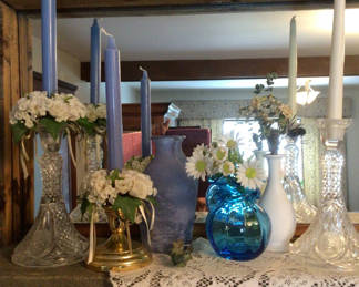 Lot 32: Blue Candles, Glass Vases, and Floral Arrangements on Lace Mantel