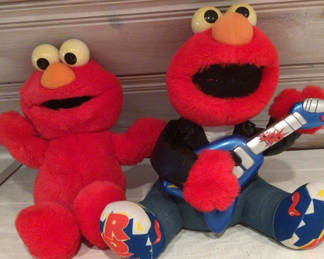 Lot 440: Sesame Street Elmo plush toys with guitar