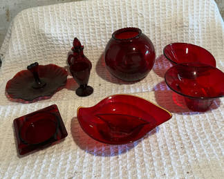 Lot 465: Red glassware set: decanter, goblet, vase, and dishes