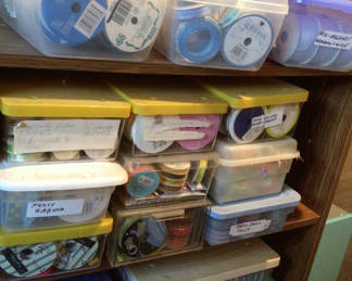 Lot 448: Craft ribbons and tape organized in plastic containers