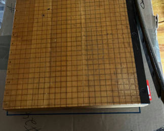 Lot 103: Wooden grid cutting mat with metal edge and guide