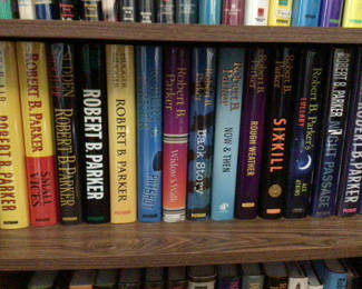 Lot 45: Signed Robert B. Parker paperback novels