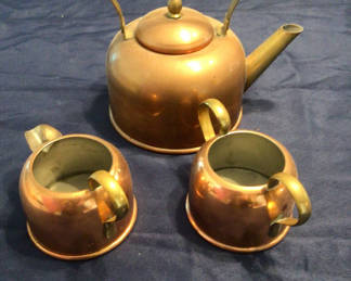 Lot 95: Copper teapot with two copper mugs