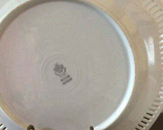 Lot 11: Floral porcelain dinnerware and serving dish