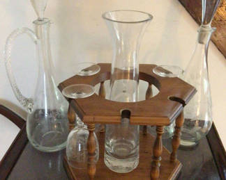 Lot 29: Glass decanter set with wooden stand