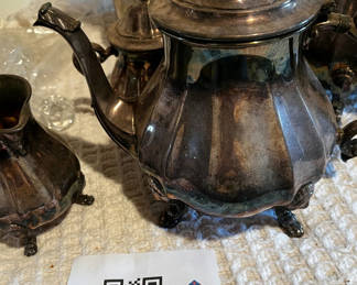 Lot 451: Vintage silverplate teapot set with lids and crystal weights
