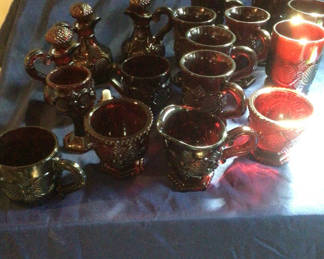 Lot 473: Cranberry glassware set: mugs, goblets, and decanters