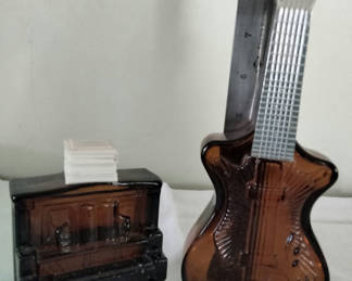 Lot 77: Avon bottles: guitar; piano with after shave
