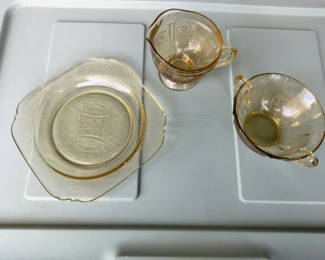 Lot 83: Amber depression glassware 