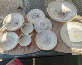 Lot 82: Vintage Royal floral dinnerware pieces with gold rims