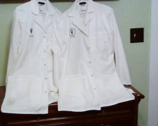 Lot 106: Two white lab coats with Cherokee branding