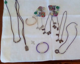 Lot 72: Assorted necklaces and bracelets with pendant charms