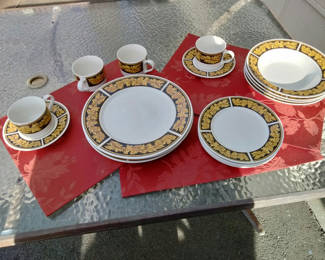 Lot 81: Gold and black laurel border dinnerware pieces