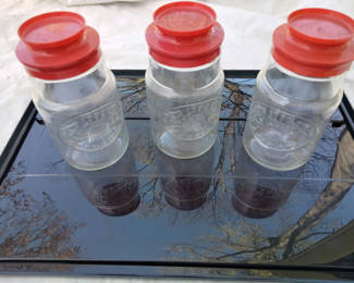 Lot 11: Commemorative 1776 glass jars with red lids 