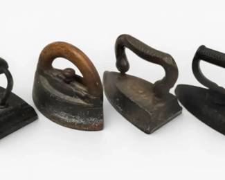 Four Antique Cast Iron Sad Irons