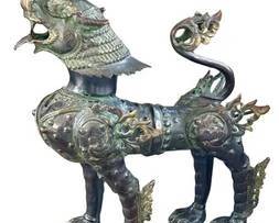 Large Chinese Brass Foo Dragon Lion Dog Metal Sculpture  Measuring about 18 in L x 11 in W x 23.5 in H, this decorative bronze Foo Dog Guardian Lion statue is commonly referred to as a Foo Dog or Thai Singha. It features intricate armor details, beaded accents, and a fierce expression, with a dark bronze surface accented by green patina from age. The raised armor plates and scrolling motifs highlight the craftsmanship and textured scales for a bold, Asian-inspired display. Ideal for entryways, foyers, or garden settings as a striking focal piece.