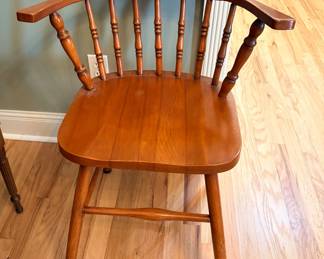 vintage wooden Captain's chair, a specific variation of the classic Windsor style