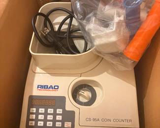 Ribao Technology CS-95A High Speed Coin Counter. It is a bank-grade, heavy-duty electronic machine used to count large volumes of international coins or tokens at speeds up to 2,300 coins per minute