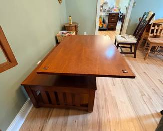 Mission-style lift-top coffee table made of stained hardwood