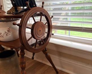 Side table with ship wheel detailing