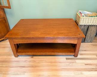 Mission-style lift-top coffee table made of stained hardwood