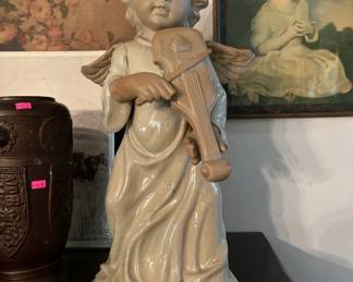 22" ceramic angel. It's nice!