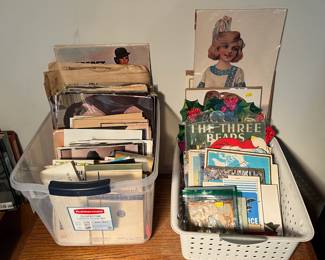 Two bins of paper items, plus old magazines, newspapers, postcards & MS Living