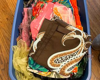 Bin of new scarves