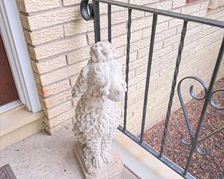 Pair of antique cement garden poodles