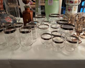 These clear glasses with silver rims, have the letter H on all of them