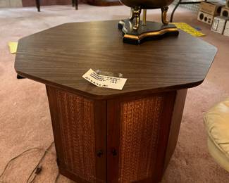Mid-century modern end table has space underneath for storage