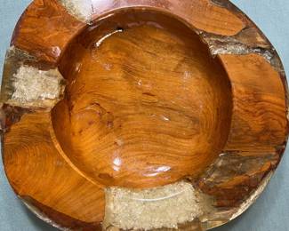 Wooden bowl with quartz crystal inside