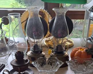 Vintage Hurricane oil lamps and candle holders.