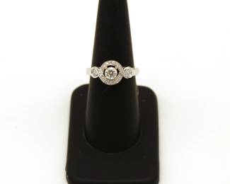 A beautiful and stylish new gold and diamond ring from the inventory at this sale