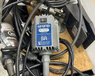 Foredom Series SR flexible shaft motor and foot-operated speed control (which is a hang-up style rotary tool commonly used for jewelry making) 