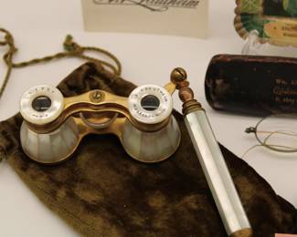 Antique mother of pearl and brass opera glasses / binoculars made by Leroy Opticien, Paris, and A. Krautheim in Muskegon, Michigan; pair of antique eyeglasses and leather eye glass case from Wm. Krautheim, Optometrist, Muskegon, Michigan