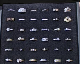Lots of estate jewelry available including these gold rings, many set with diamonds, a variety of styles to choose from