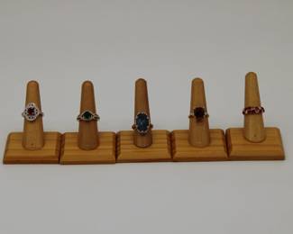 18k gold red spinel and diamond ring, 14k gold emerald and diamond ring, 14k gold and aquamarine ring, 14k gold Rhodolite garnet and diamond ring, 18k ruby and diamond band