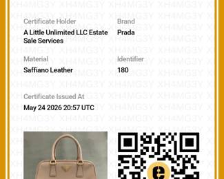 Certificate of Authenticity from Entrupy for the Prada Saffiano Lux Pyramid Frame bag in a neutral beige tone with distinctive gold-toned hardware; authenticated by Entrupy.