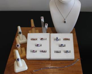 Gold jewelry set with rubies, sapphires, and diamonds - fashion rings, bracelets earrings