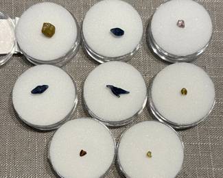 Upper left: a 6.05ct Zaire rough diamond; the rest are Fancy Color Mackle rough diamonds