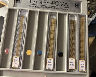 Hadley-Roma Fine Quality Watch Attachments display case featuring gold and two-tone expansion watch bands