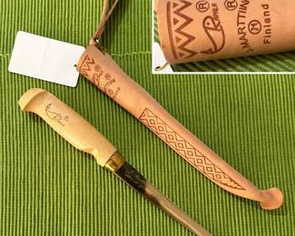 Marttiini-made Rapala Fish 'N Fillet knife with a birch handle and leather sheath