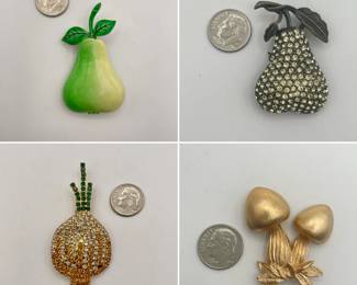 Enamel on metal pear fruit brooch, a black metal and rhinestone pear shape brooch, a sparkly colorful rhinestone Bermuda onion brooch, and a gold tone satin finish dimensional mushroom brooch